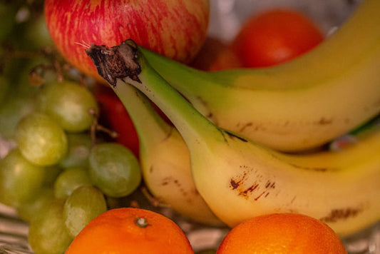 fruits collage: bananas, oranges and apples